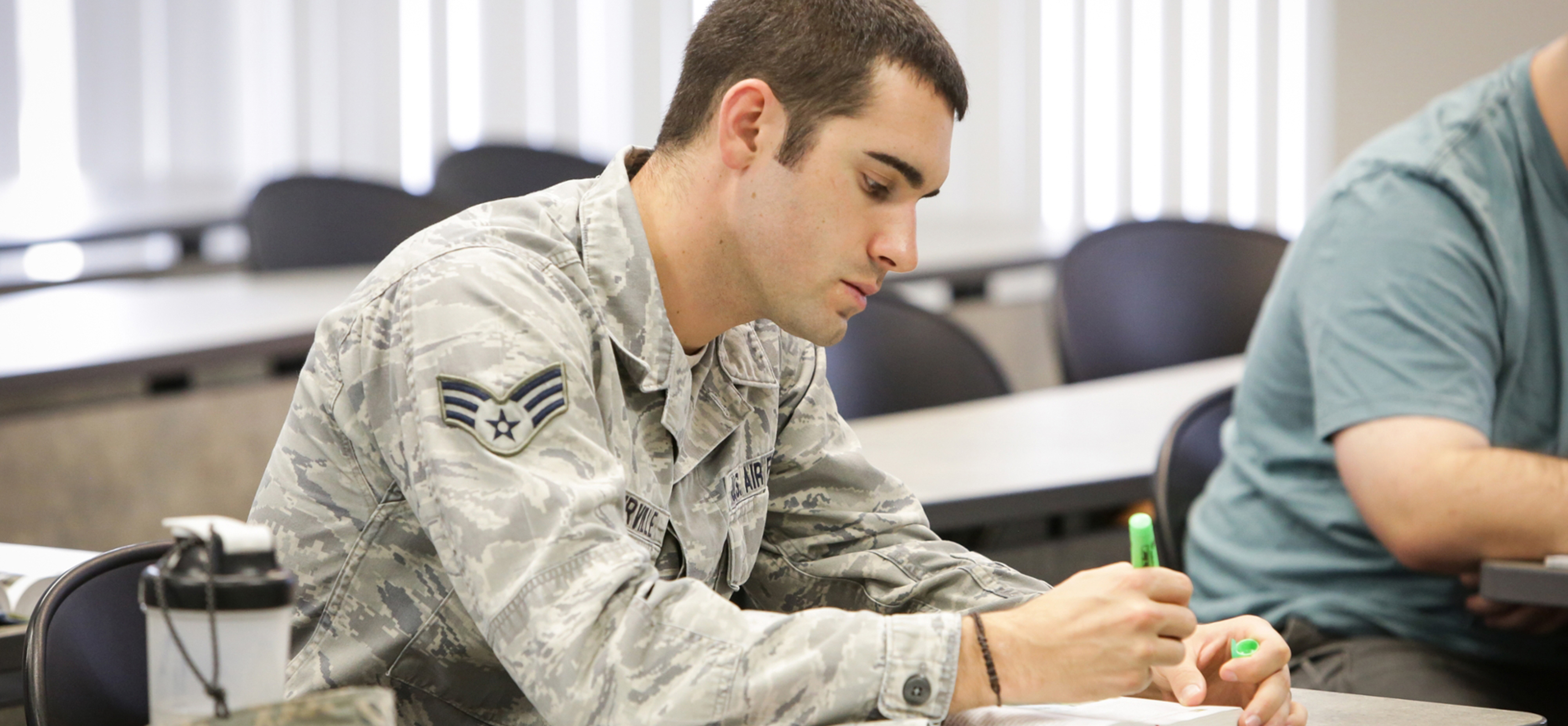 Military student testing in classroom